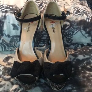 Metalika beige,black  and snake platform shoes.